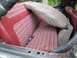 Rear seat, seating surface has no tears, one or two small rips in front vertical section of bottome ...
